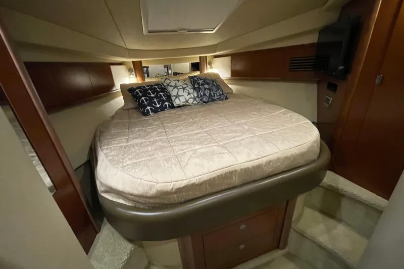 Slide: The Image of Luxurious cabin interior of 2007 Sea Ray 40 Sundancer yacht with cozy bedding. - 33