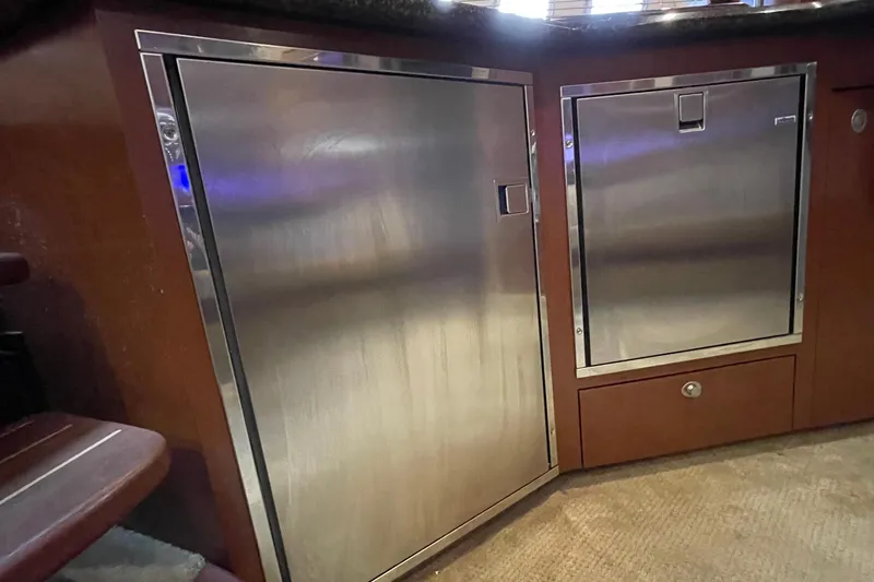 Slide: The Image of Stainless steel cabinets in 2007 Sea Ray 40 Sundancer yacht interior. - 37