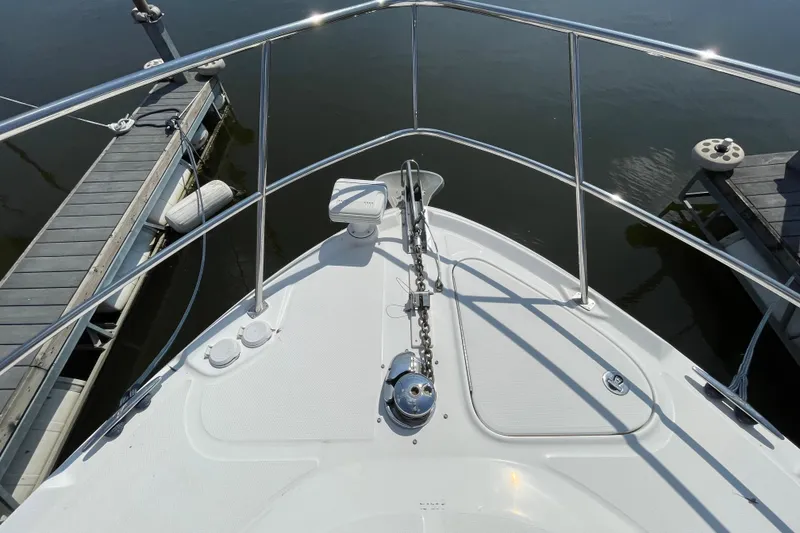 Slide: The Image of Bow view of 2007 Sea Ray 40 Sundancer yacht docked at marina. - 7