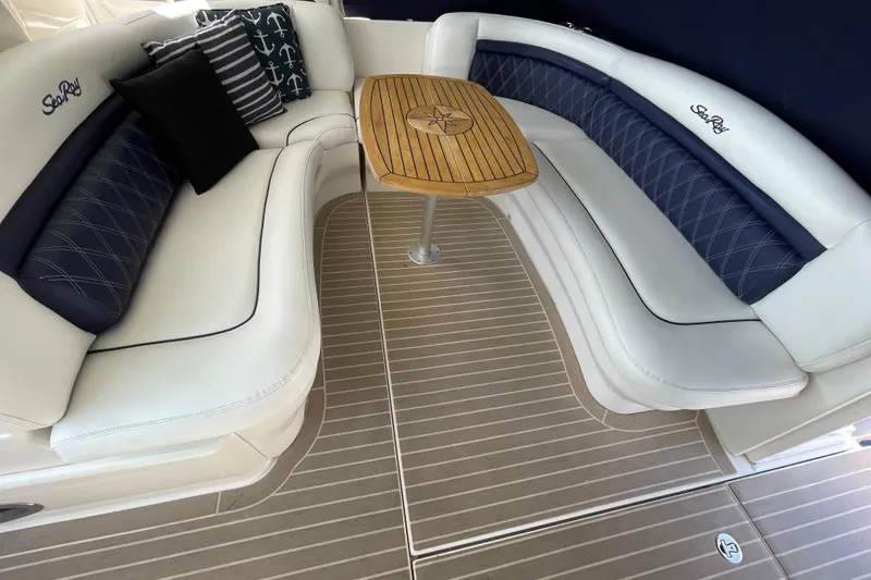 Slide: The Image of Luxurious seating area on a 2007 Sea Ray 40 Sundancer yacht with nautical-themed cushions. - 11