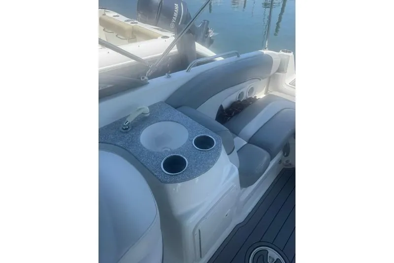 Slide: The Image of Interior of 2021 NauticStar 243 DC boat with seating and sink area. - 15