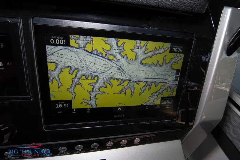Slide: The Image of A navigation screen on a 2023 Fountain 32 NX boat displays a detailed nautical chart. - 36