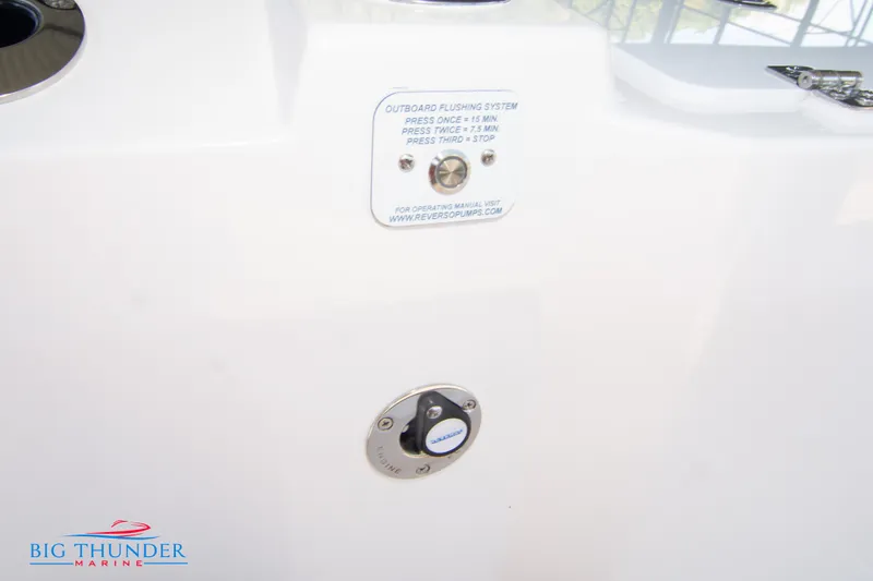 Slide: The Image of Close-up of a boat part with a flushing system and label. - 16