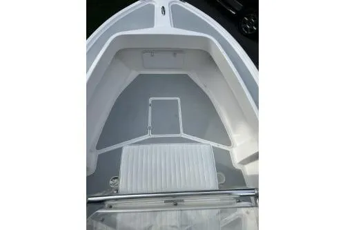 Slide: The Image of 2019 North Coast 190CC boat interior, featuring a spacious, clean deck and seating area. - 6