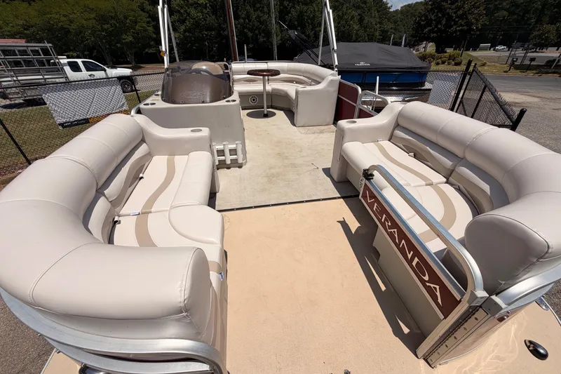 Slide: The Image of 2013 Veranda 24 pontoon boat with spacious seating and modern design. - 5