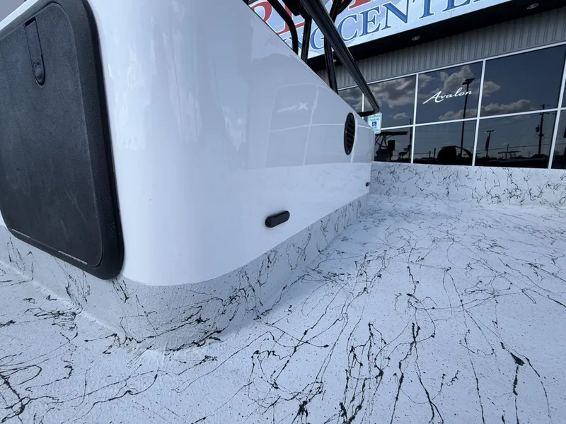 Slide: The Image of Close-up of the 2026 Dargel 250 Kat HDX with sleek design and textured flooring. - 14