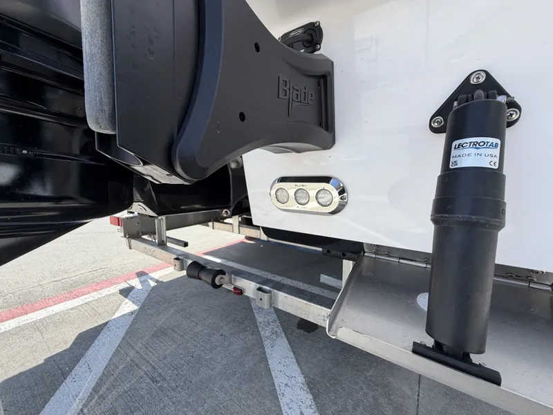 Slide: The Image of Close-up of a Dargel 250 Kat HDX stern with Electrotab and Blade logo. - 10