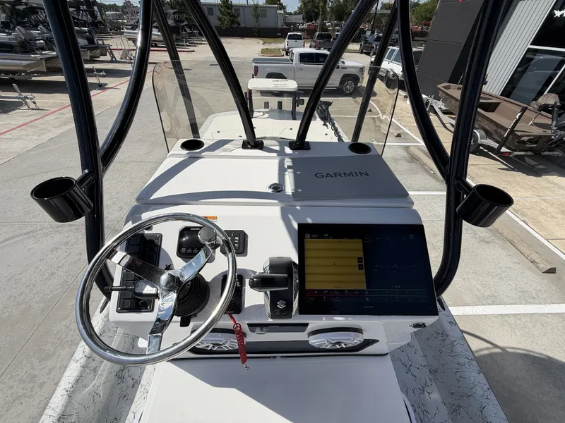 Slide: The Image of The image shows the helm of a 2026 Dargel 250 Kat HDX with a Garmin display. - 16