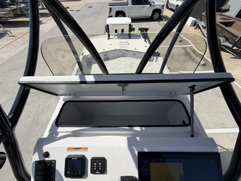 Slide: The Image of The image shows the cockpit of a 2026 Dargel 250 Kat HDX with controls and electronics. - 17