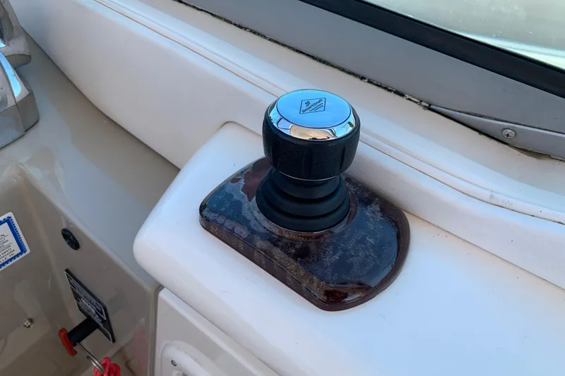 Slide: The Image of Joystick control on 2011 Sea Ray Sundancer 370 boat dashboard. - 30