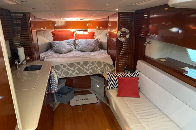 Slide: The Image of Luxurious interior of 2011 Sea Ray Sundancer 370 yacht with cozy bed and seating area. - 35