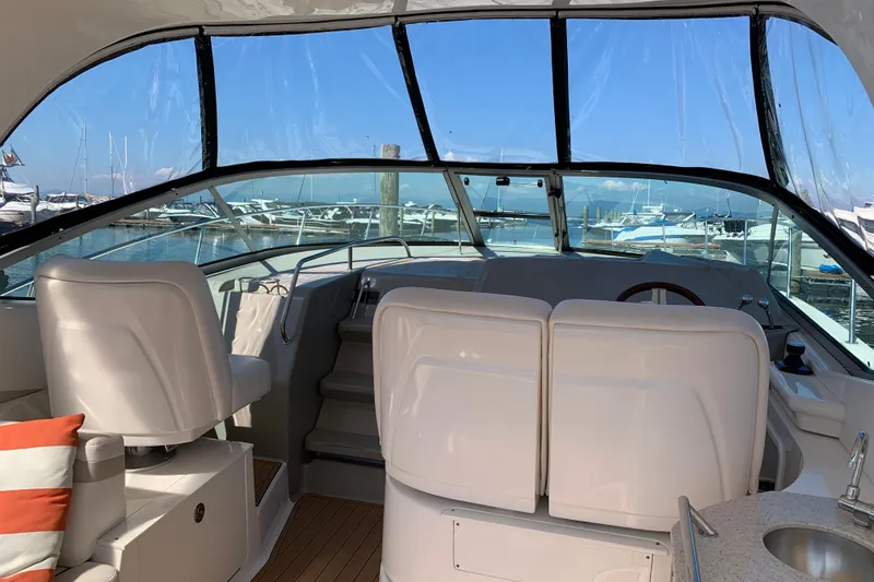 Slide: The Image of Interior view of 2011 Sea Ray Sundancer 370 yacht with marina backdrop. - 20