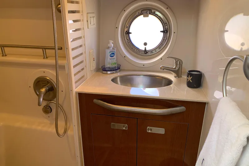 Slide: The Image of Bathroom interior of 2011 Sea Ray Sundancer 370 yacht with sink and shower. - 43