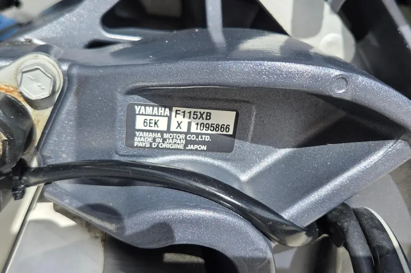 Slide: The Image of Close-up of Yamaha F115XB engine label on a 2022 Key West 189 FS boat. - 15