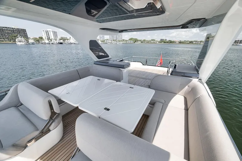 Slide: The Image of Luxurious 2022 Galeon 560 Fly yacht interior with spacious seating and elegant design. - 75