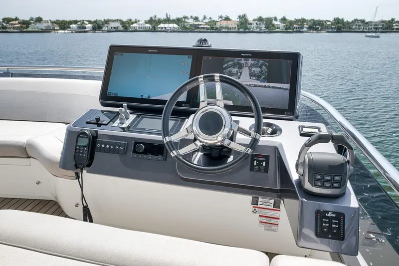 Slide: The Image of Helm of 2022 Galeon 560 Fly yacht with advanced navigation systems and controls. - 67