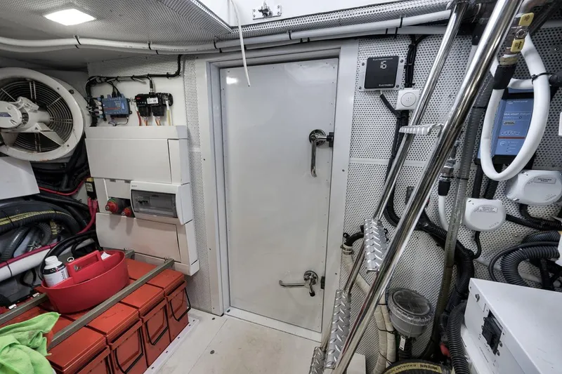 Slide: The Image of Engine room of 2022 Galeon 560 Fly yacht with equipment and storage. - 103