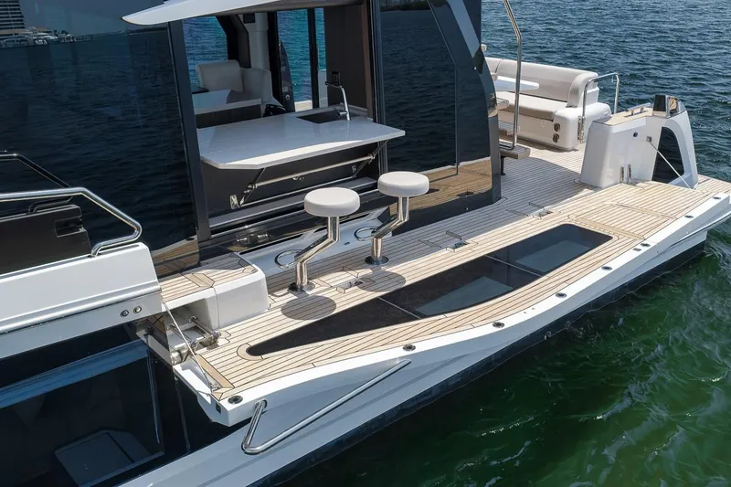 Slide: The Image of Luxury Galeon 560 Fly yacht deck, 2022 model, featuring elegant seating and modern design. - 31