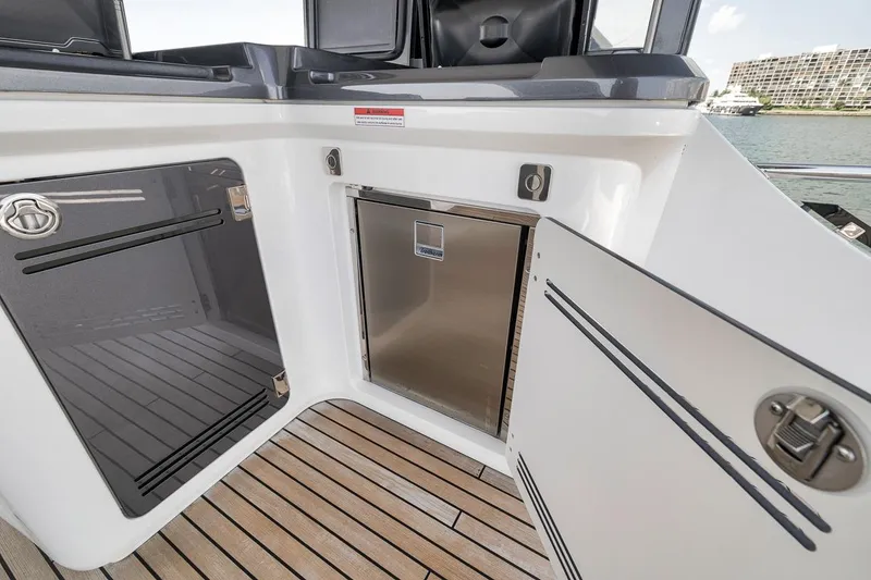 Slide: The Image of Luxury Galeon 560 Fly yacht interior, featuring sleek cabinetry and modern design, 2022 model. - 82