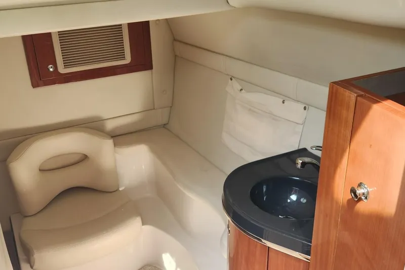 Slide: The Image of 2006 Doral Elegante boat interior with seating and sink area. - 7
