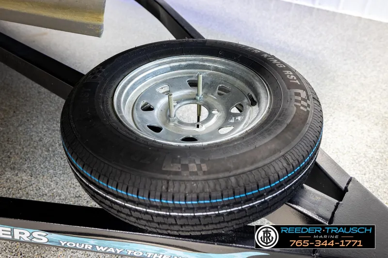 Slide: The Image of 2024 Avalon CAT VRB trailer tire on display at Reeder Trausch Marine. - 54