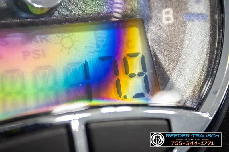 Slide: The Image of Close-up of Avalon CAT VRB 2024 dashboard with digital display and rainbow reflection. - 38