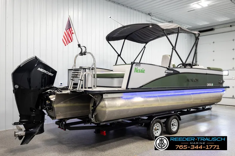 Slide: The Image of 2024 Avalon CAT VRB pontoon boat with Mercury engine in showroom. - 6