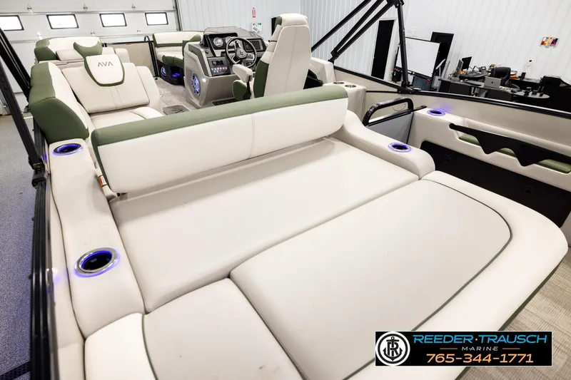 Slide: The Image of Luxurious interior of 2024 Avalon CAT VRB boat with plush seating and modern dashboard. - 11