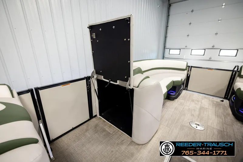 Slide: The Image of Interior of 2024 Avalon CAT VRB pontoon boat with plush seating and modern design. - 21