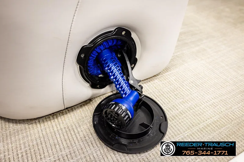 Slide: The Image of 2024 Avalon CAT VRB marine component with blue hose on beige surface. - 47
