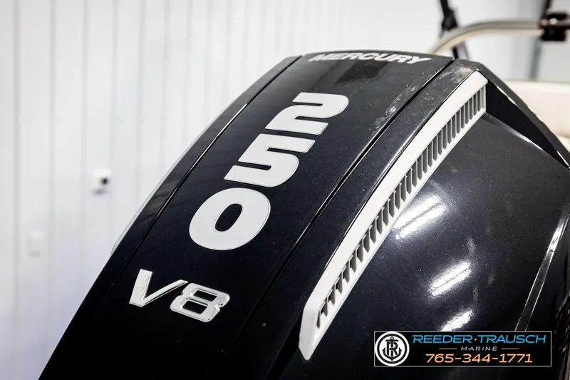 Slide: The Image of Mercury 250 V8 engine on 2024 Avalon CAT VRB boat, Reeder-Trausch Marine contact info visible. - 52