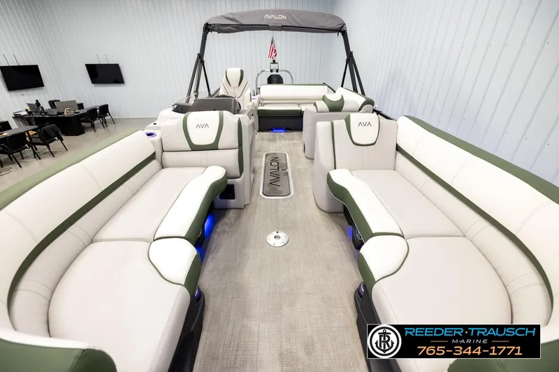 Slide: The Image of 2024 Avalon CAT VRB pontoon boat interior with plush seating and modern design. - 13