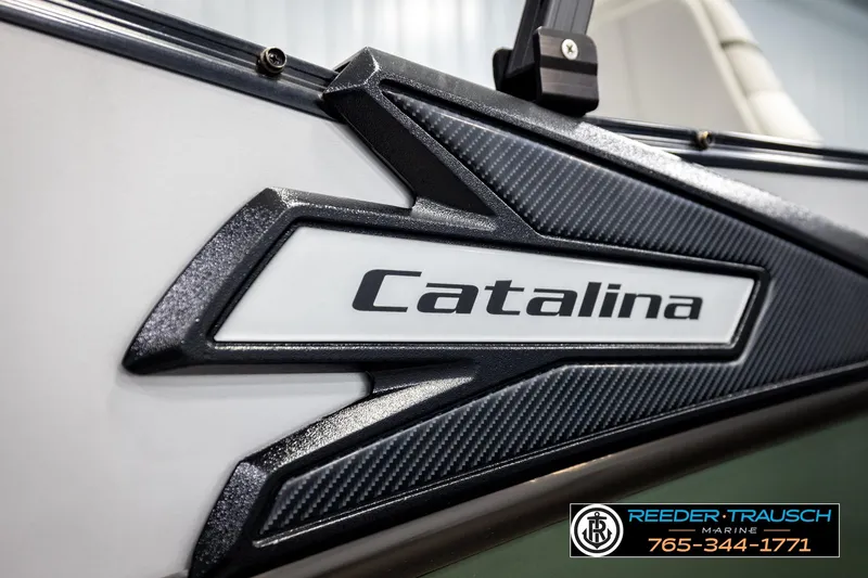 Slide: The Image of Close-up of 2024 Avalon CAT VRB boat with Catalina branding and Reeder Trausch Marine logo. - 57