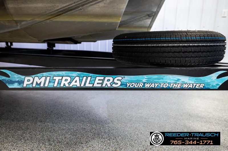 Slide: The Image of Trailer with spare tire, featuring PMI Trailers branding, Reeder Trausch Marine contact details. - 55