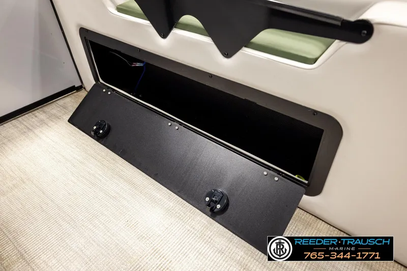 Slide: The Image of 2024 Avalon CAT VRB storage compartment with open hatch, showcasing interior space. - 48