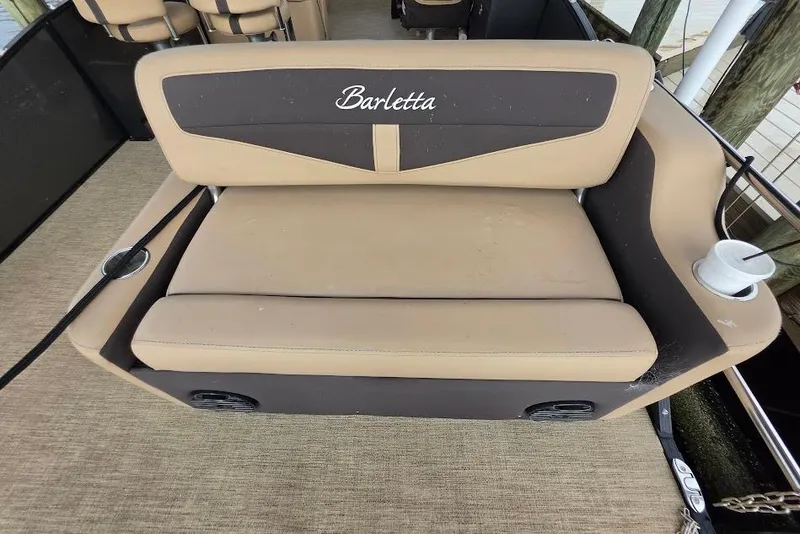 Slide: The Image of Barletta Cabrio 24UE 2022 boat seat with cup holder, beige and brown upholstery. - 20