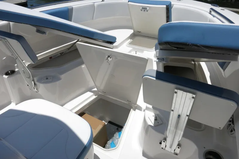 Slide: The Image of 2026 Robalo R250 Center Console boat interior with open storage compartments. - 28