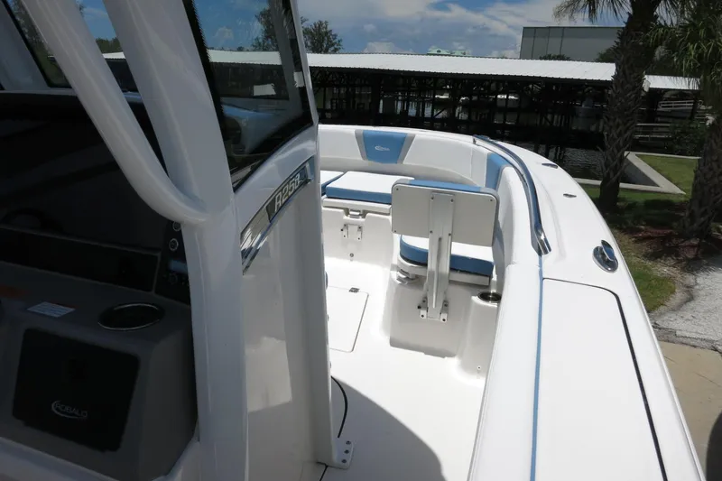 Slide: The Image of 2026 Robalo R250 Center Console boat interior with seating and console view. - 20