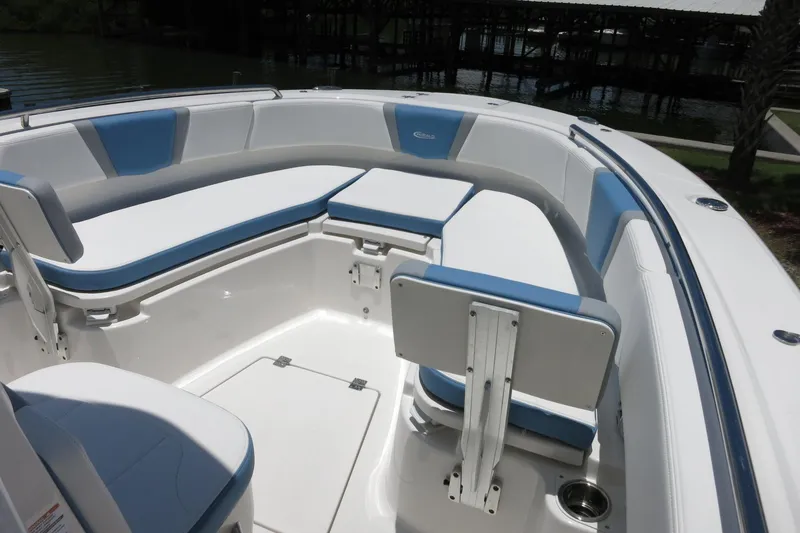 Slide: The Image of 2026 Robalo R250 Center Console boat with spacious seating and modern design. - 26