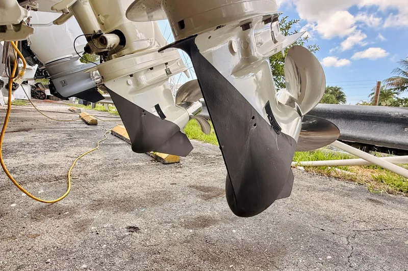 Slide: The Image of 2018 Sea Chaser 27 HFC CC boat propellers on a sunny day. - 13