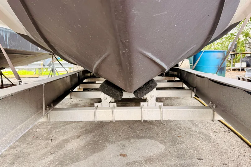 Slide: The Image of 2018 Sea Chaser 27 HFC CC boat hull on trailer, close-up view. - 8
