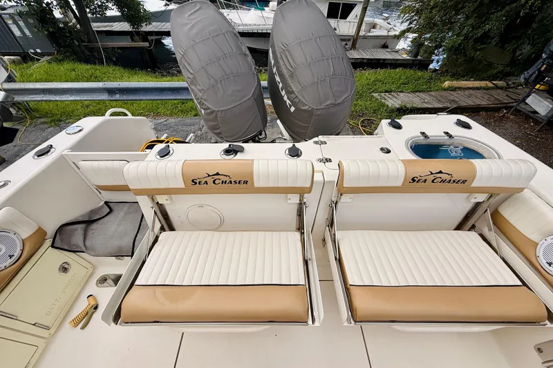 Slide: The Image of 2018 Sea Chaser 27 HFC CC boat with dual seats and Suzuki engines. - 20
