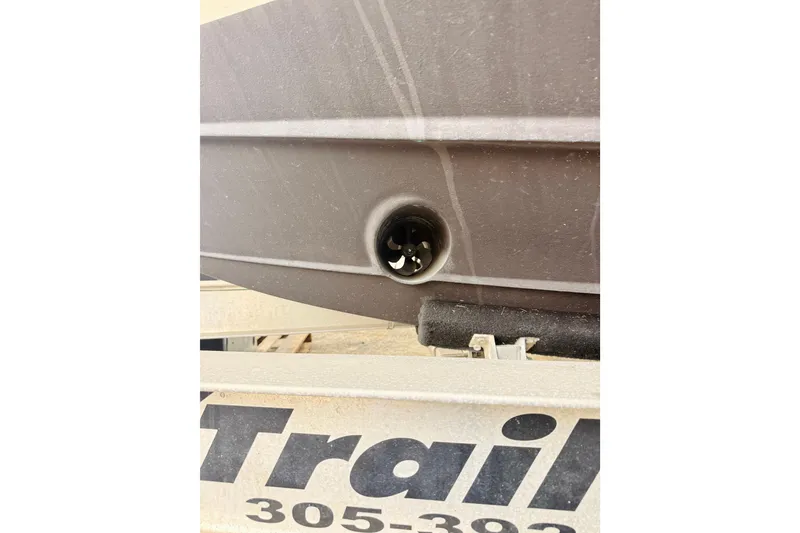 Slide: The Image of Close-up of 2018 Sea Chaser 27 HFC CC boat hull on trailer. - 9