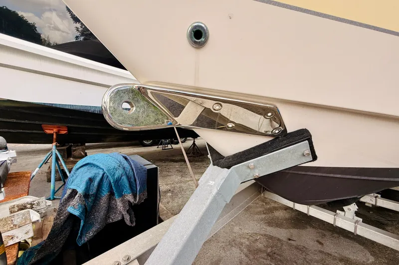 Slide: The Image of 2018 Sea Chaser 27 HFC CC boat on trailer, close-up of hull and support. - 7