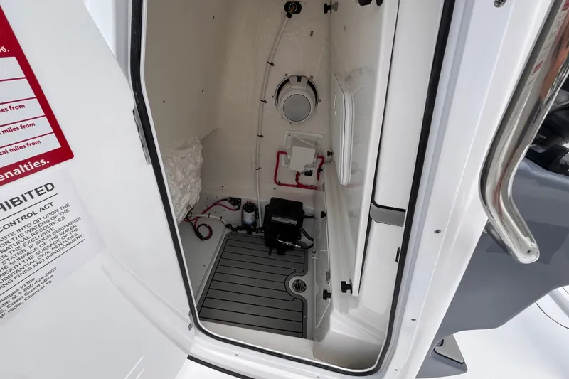 Slide: The Image of Interior view of 2027 Tidewater 2500 Carolina Bay boat compartment. - 12