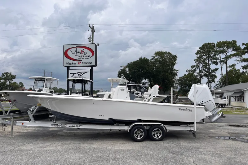 The Image of 2027 Tidewater 2500 Carolina Bay boat on trailer at Marker 17 Marine dealership. - 0