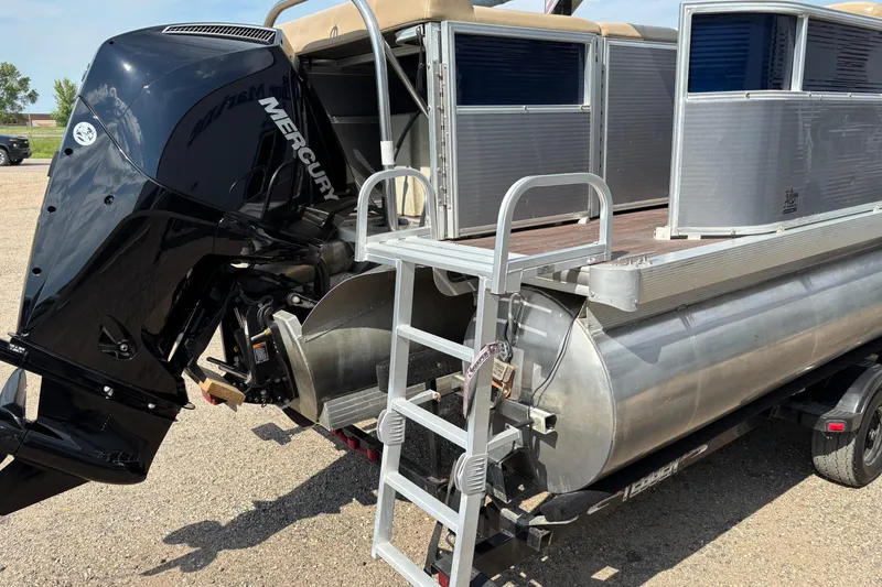 Slide: The Image of 2006 South Bay 23 pontoon boat with Mercury outboard motor and boarding ladder. - 3
