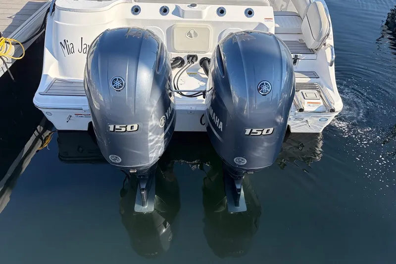 Slide: The Image of Twin Yamaha 150 engines on a 2022 Sea Fox 268 Commander boat. - 4