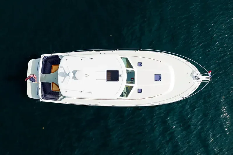 Slide: The Image of Aerial view of 2017 Back Cove Yachts 37 on open water. - 9