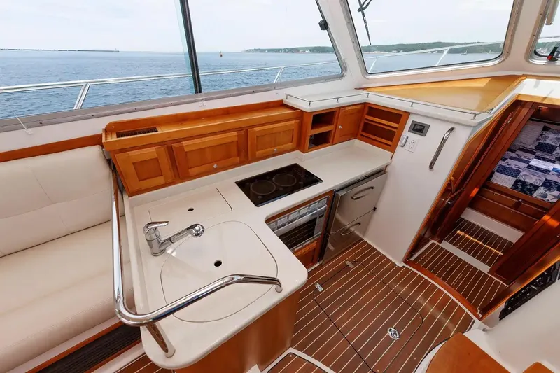 Slide: The Image of Luxurious 2017 Back Cove Yachts 37 interior with modern kitchen and ocean view. - 41